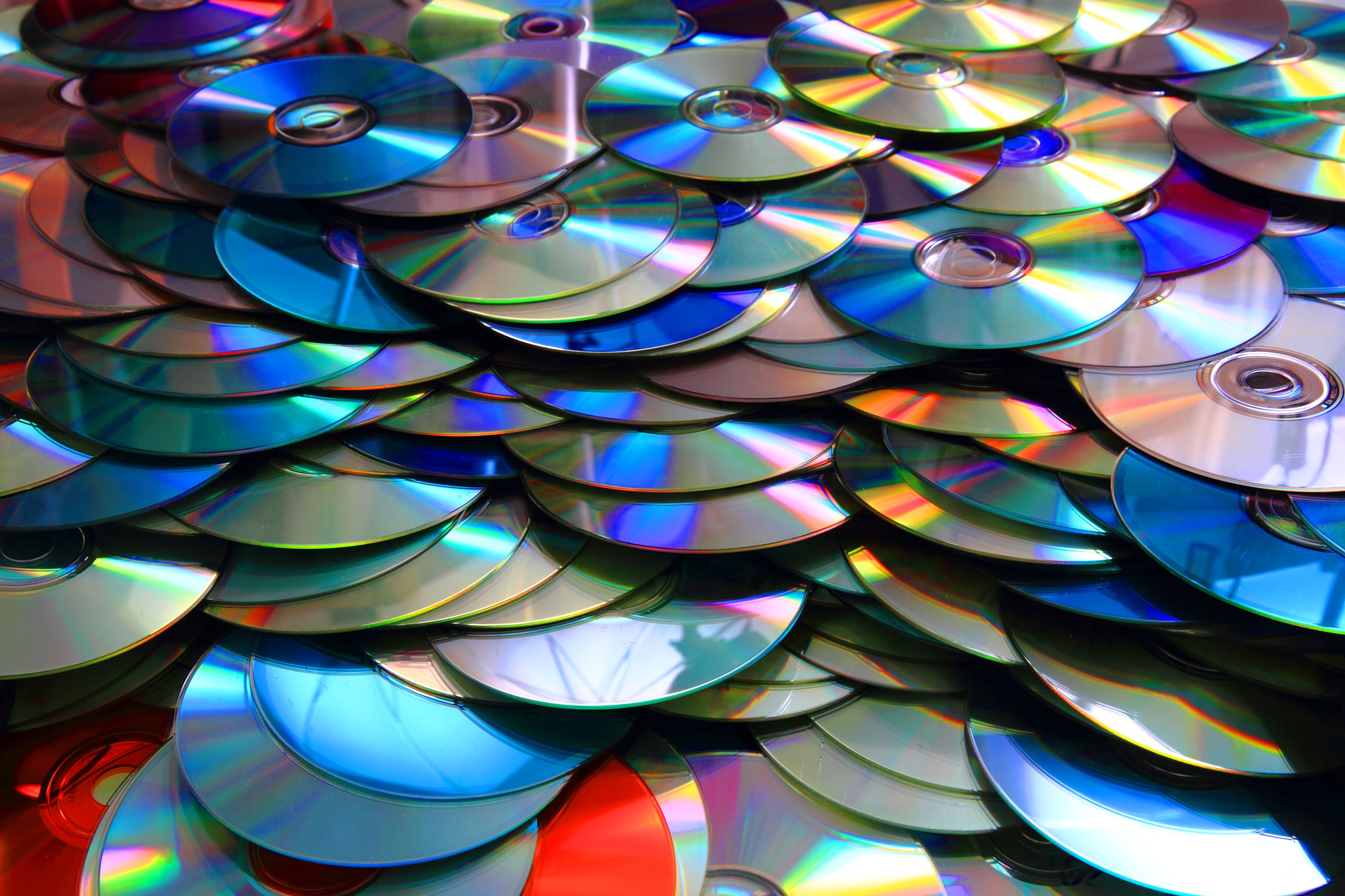 A stack of thousands of CD’s to represent music visibility on streaming platforms.