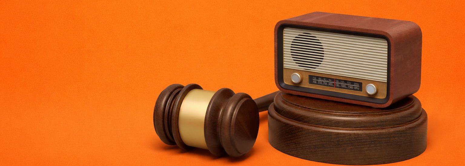 old radio on an orange background